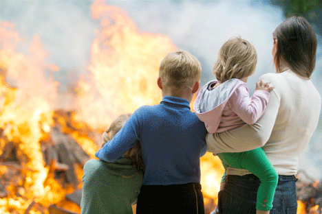 family observing hazmat response from safe distance